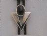 Black oval stone with a silver V bolo