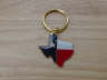 Gold Texas shape keyring.